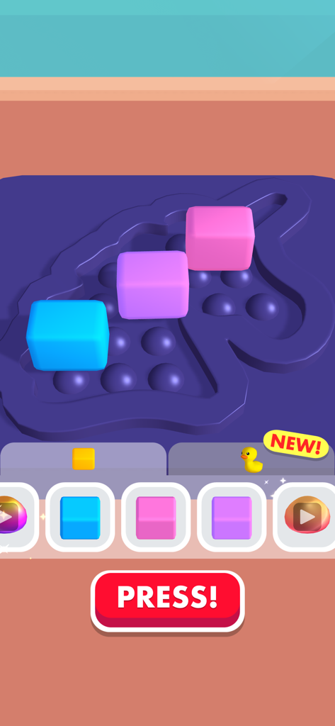 Creating a custom unicorn fidget toy by placing colorful blocks in a mold