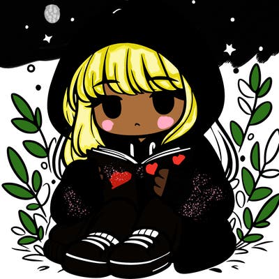 girl in oversized hoodie reading a book