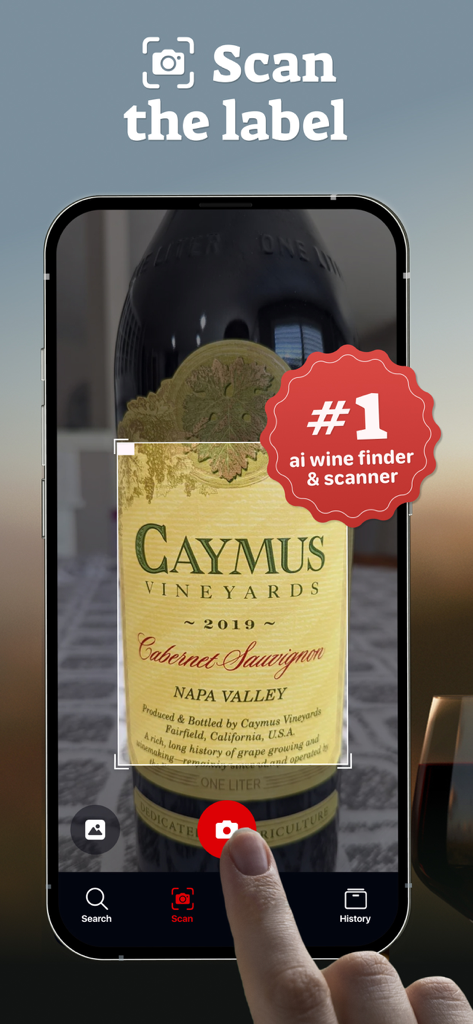 Wine ID: AI Scanner & Tracker - A person scanning a wine bottle label using the Wine ID AI scanner app