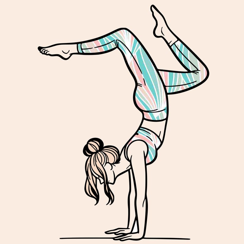 a woman doing a handstand