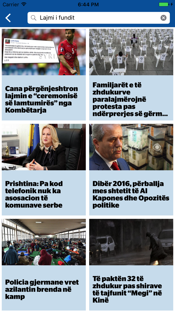 Syri - Interfaz móvil de la aplicación de noticias Syri mostrando una cuadrícula de artículos de noticias con imágenes y titulares en albanés