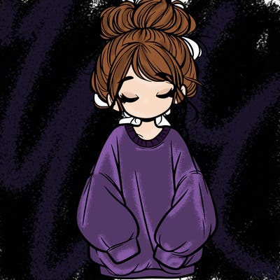 girl with baggy sweatshirt and messy bun
