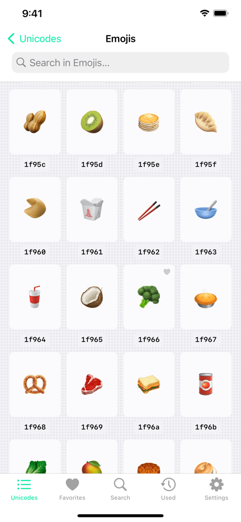 Interface do aplicativo Codepoint exibindo uma grade de emojis de comida com seus códigos hexadecimais unicode