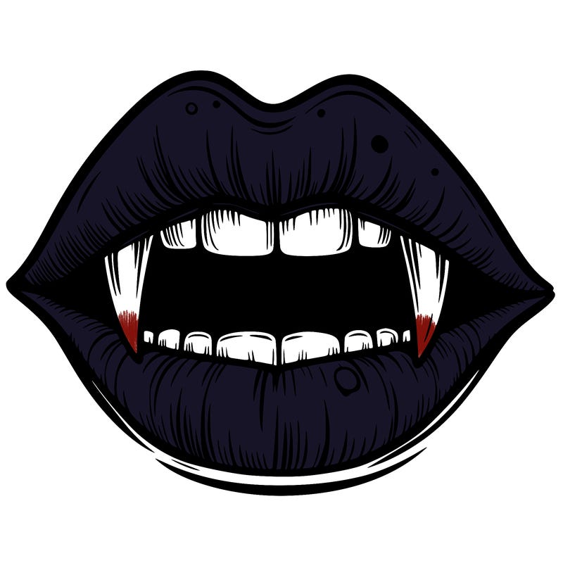 lips with vampire teeth