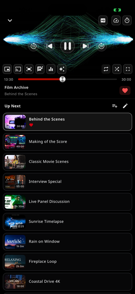 xDL - Cloud Files Downloader - Interfaz del reproductor multimedia de xDL mostrando controles de reproducción de vídeo y una lista de reproducción próxima.