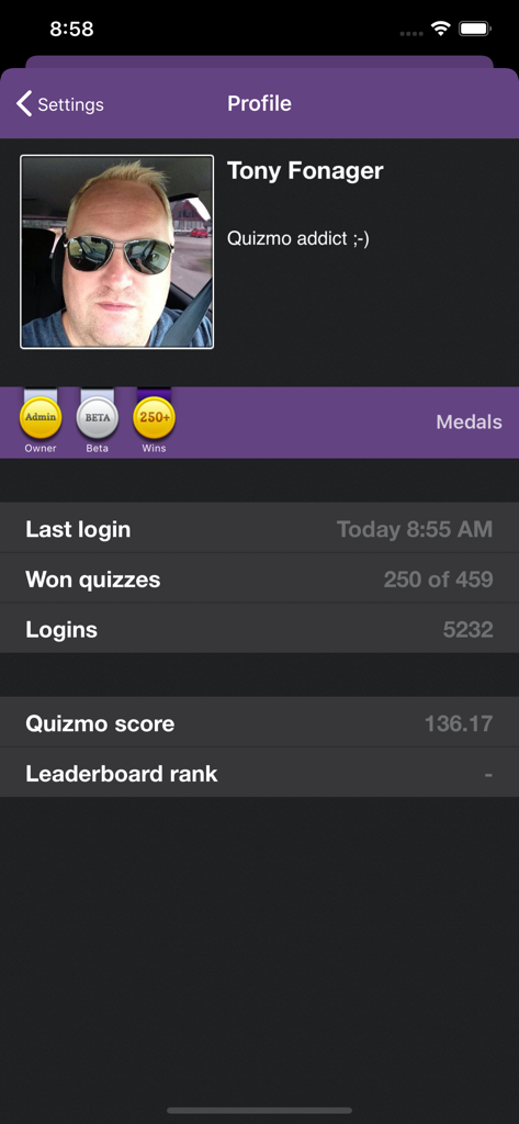 Quizmo - Quizmo trivia app user profile screen showing medals and game statistics