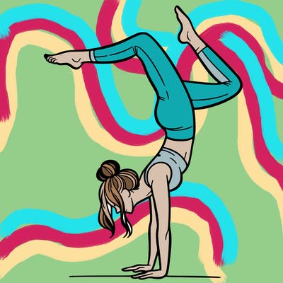 a woman doing a handstand