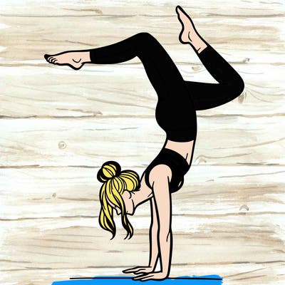 a woman doing a handstand