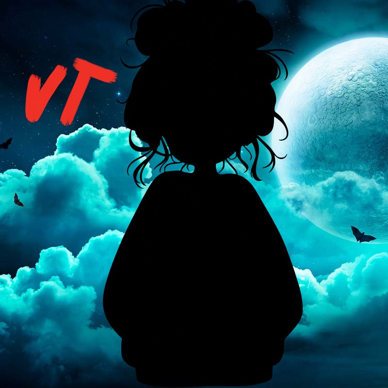 girl with baggy sweatshirt and messy bun