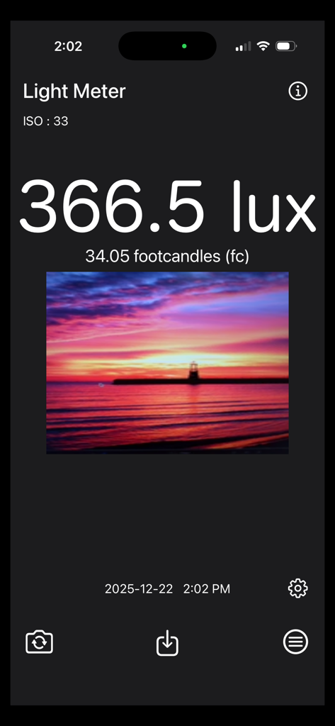 Light Meter - Brightness Calc - Light Meter app interface showing lux and footcandle measurements with a reference sunset photo