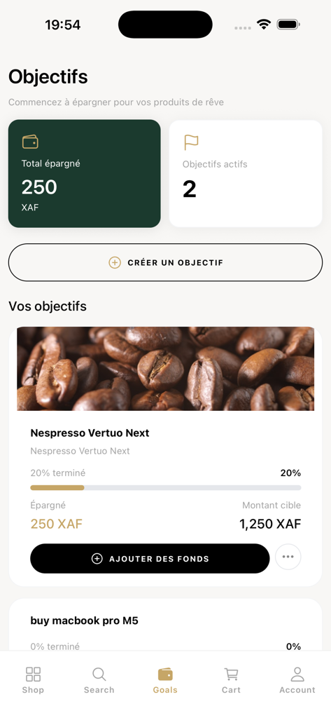 Mobile interface of Kauri app showing savings progress for a Nespresso coffee machine and a MacBook Pro.