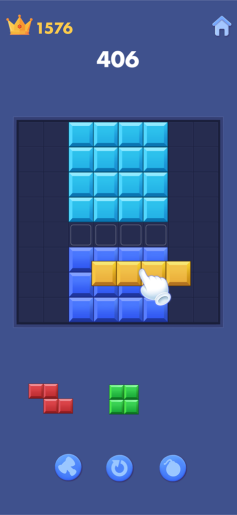 Block Blast - Block Puzzle - Block Blastパズルゲーム画面、手が青い正方形のグリッドに黄色のブロックをドラッグしている様子。