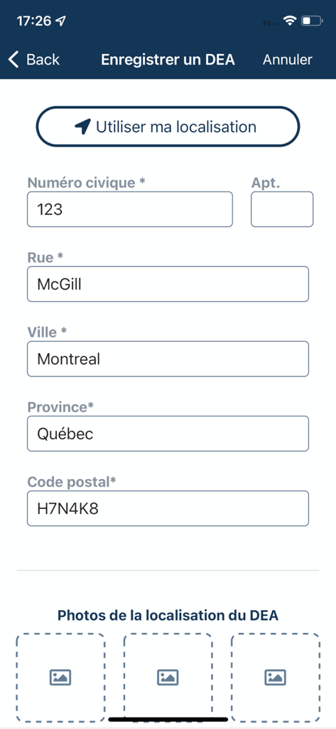 AED - Quebec - 住所の詳細と写真アップロード用のプレースホルダーが含まれる、新しい除細動器の場所を登録するためのAED Quebecアプリ画面。