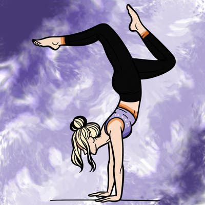 a woman doing a handstand