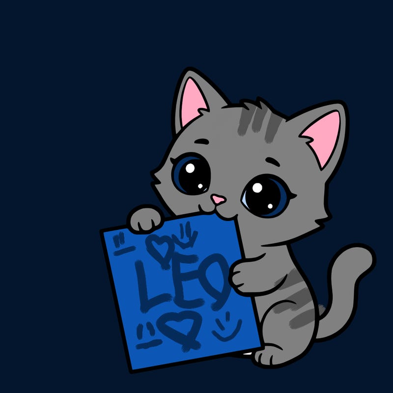 a small cat with a blank sheet of paper in its hand. the cat is sooooooo cute!