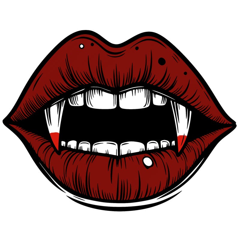 lips with vampire teeth