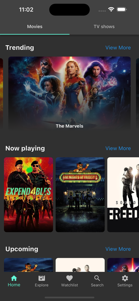 Home screen of the myFilms app showing categories for trending and now playing movies.