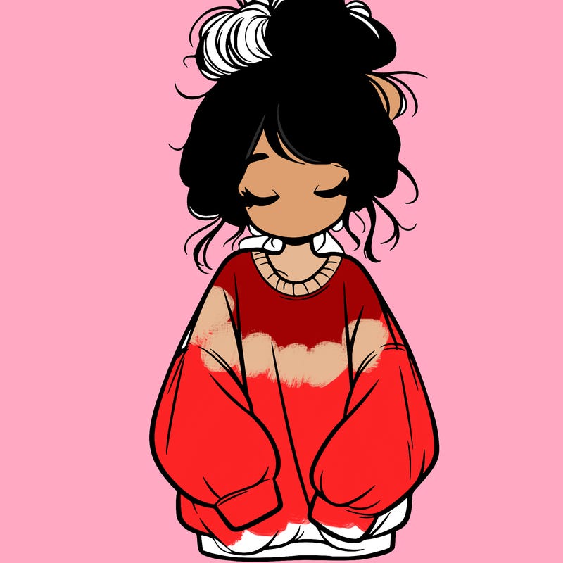girl with baggy sweatshirt and messy bun