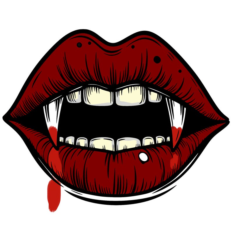 lips with vampire teeth