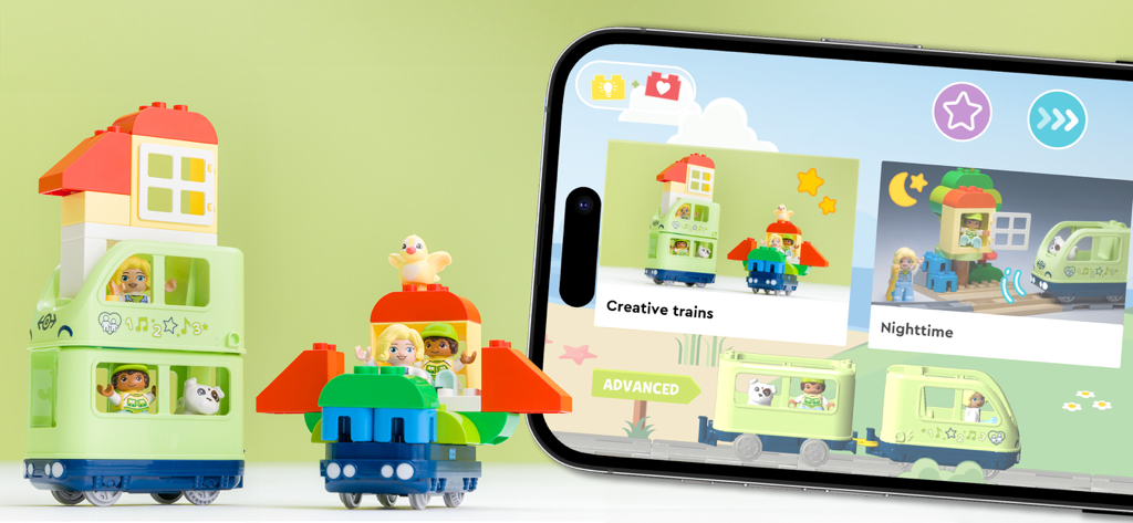 LEGO® DUPLO® Trains - Physical LEGO DUPLO train toys next to a smartphone showing the companion app interface