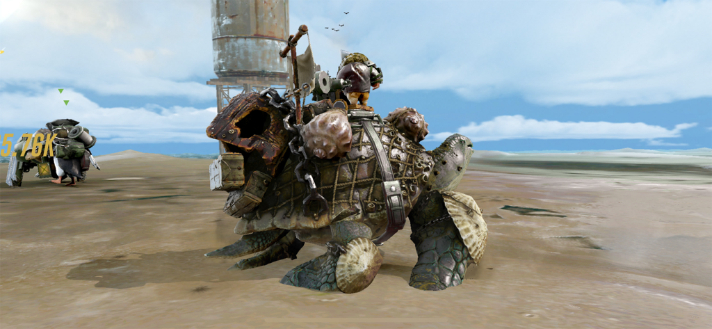 A heavily armored war tortoise with a pilot traversing a desert landscape