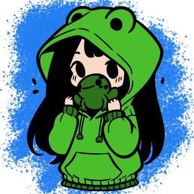 a girl holding a froggy hoodie