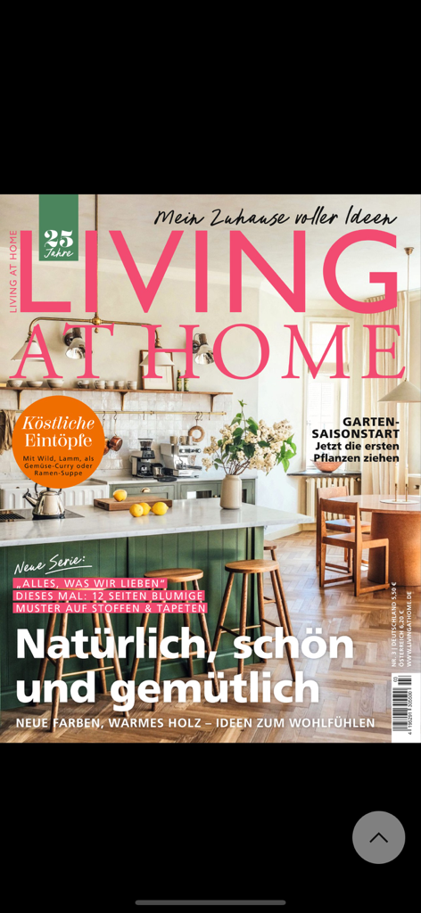 Living at Home - Cover of Living at Home magazine showing a stylish kitchen with a green island and wooden stools.