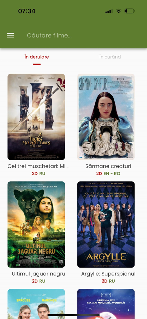 A mobile app screen displaying a list of current movies including Poor Things and Argylle with their posters and viewing formats.