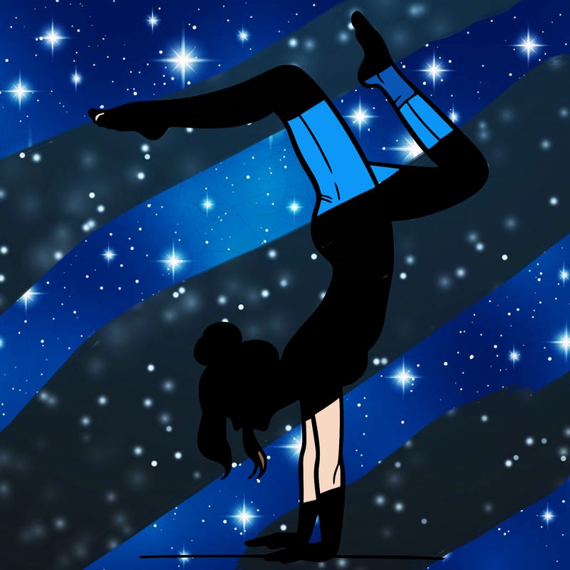 a woman doing a handstand