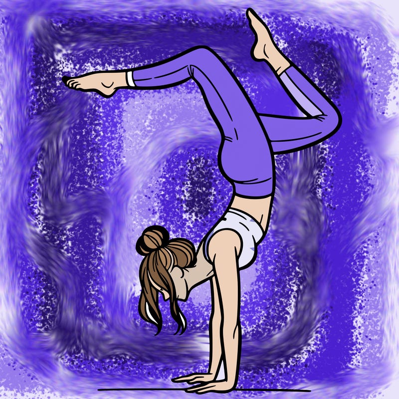 a woman doing a handstand