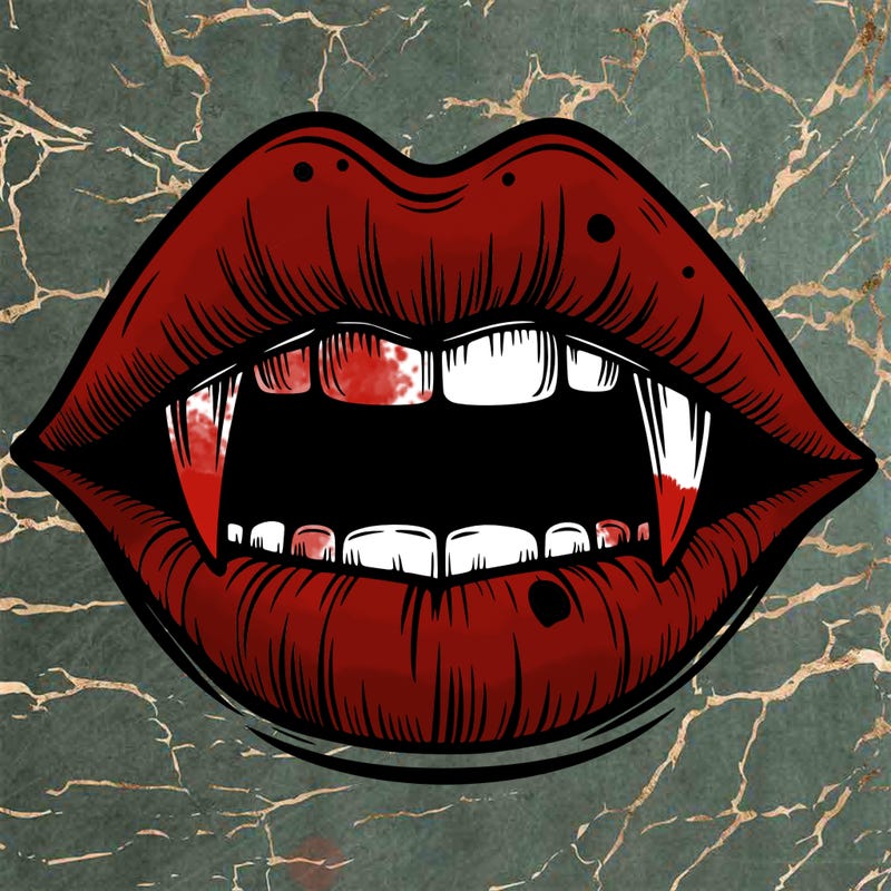 lips with vampire teeth