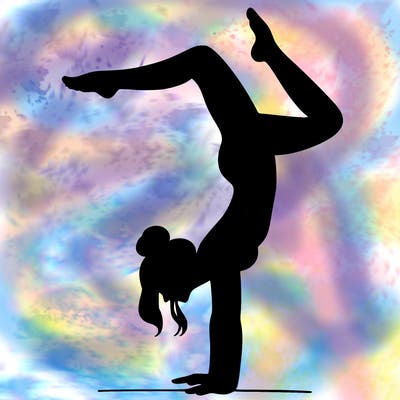 a woman doing a handstand