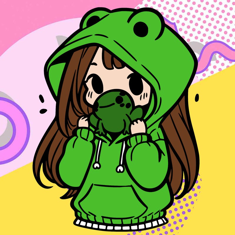 a girl holding a froggy hoodie