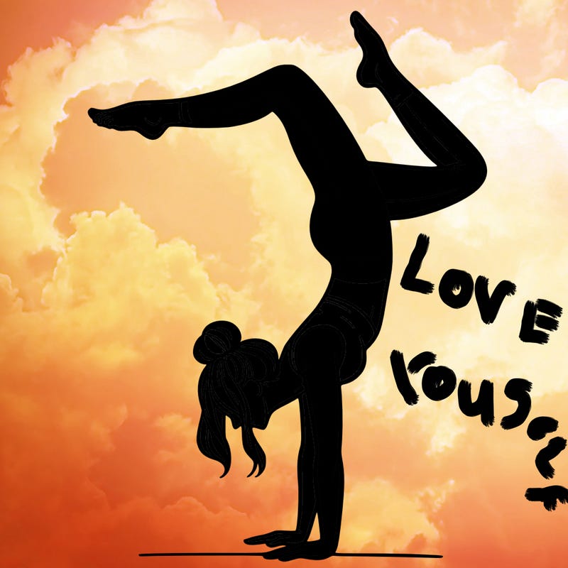 a woman doing a handstand