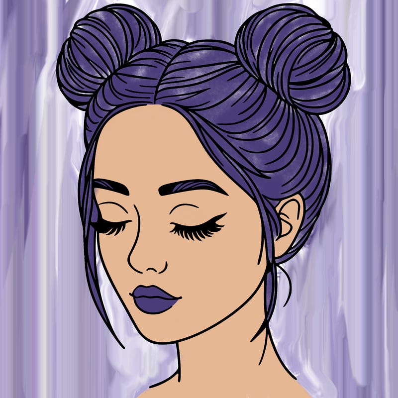 woman with hair buns