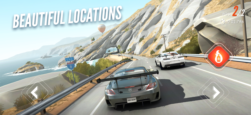 山々と熱気球を背景に、日差しが降り注ぐ海岸沿いの高速道路で2台のスポーツカーがレースをしている様子。