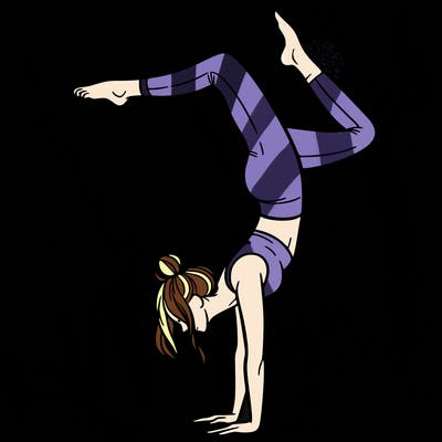 a woman doing a handstand