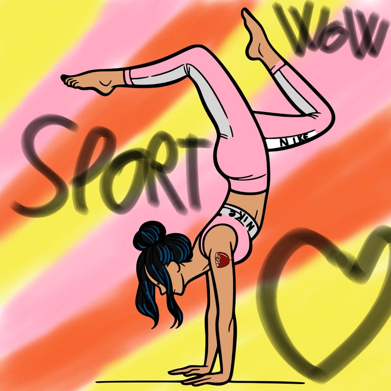 a woman doing a handstand