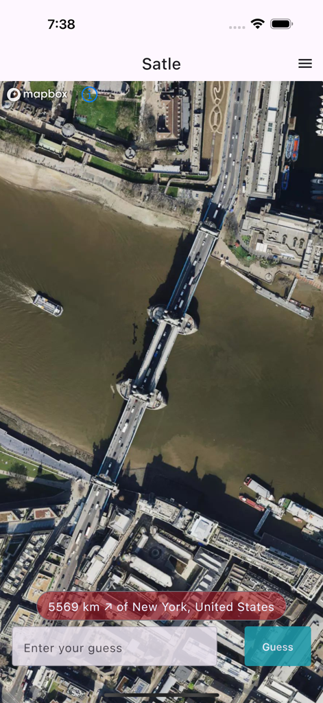 Satellite view of Tower Bridge in London within the Satle geography puzzle app