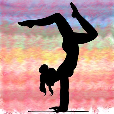 a woman doing a handstand