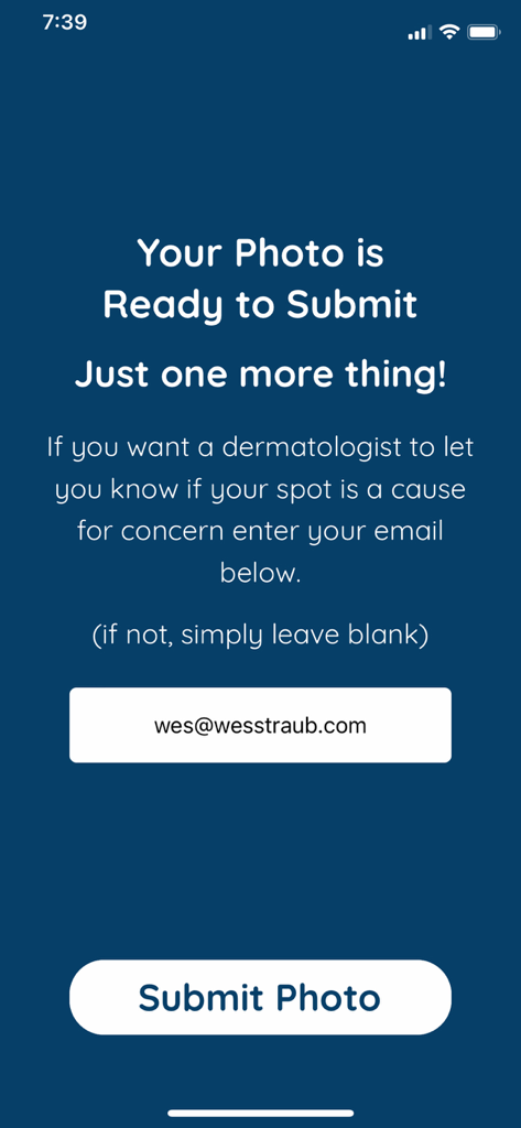 Dermos - A screen in the Dermos app confirming a photo is ready for submission with an email input field for dermatologist review.