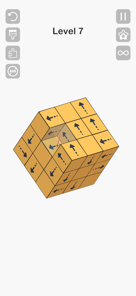A 3D yellow cube puzzle with directional arrows on blocks in Tap Master mobile game