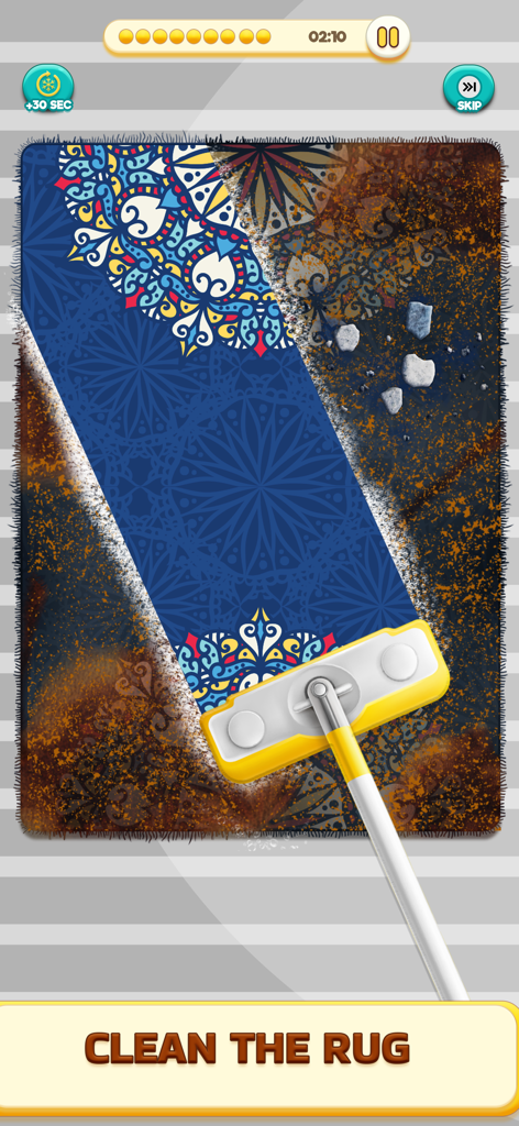 Satisfying Tidy ASMR Cleaning - A cleaning tool removing dirt from an ornate blue rug in a satisfying ASMR mobile game.