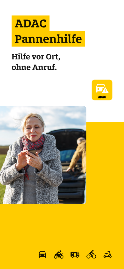 ADAC Pannenhilfe - Woman using a smartphone for roadside assistance in front of a broken down car