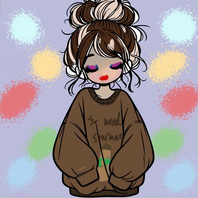 girl with baggy sweatshirt and messy bun