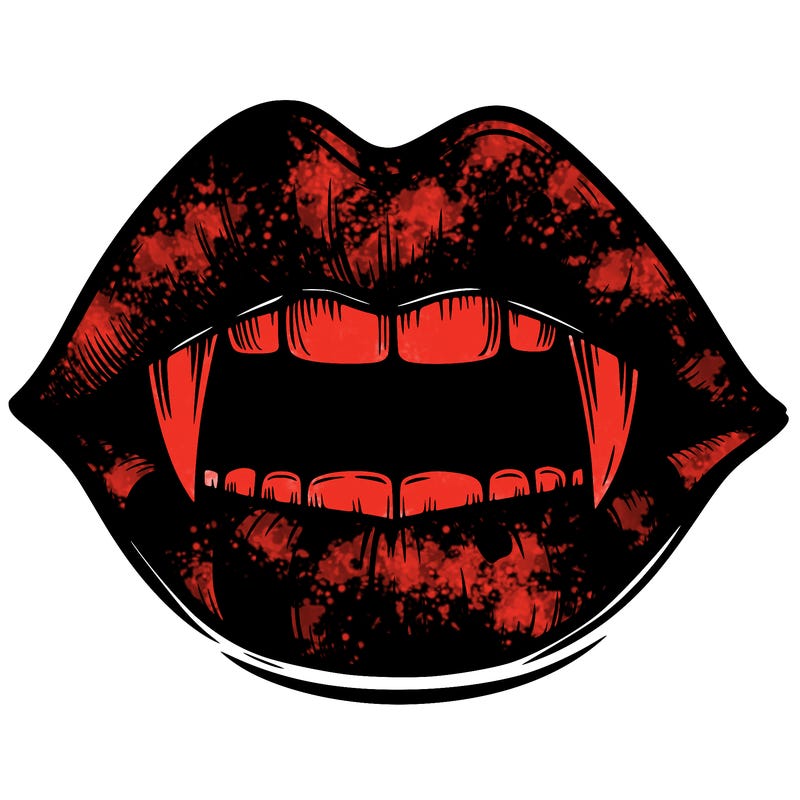 lips with vampire teeth