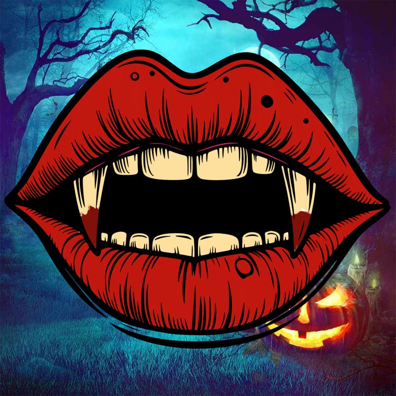 lips with vampire teeth
