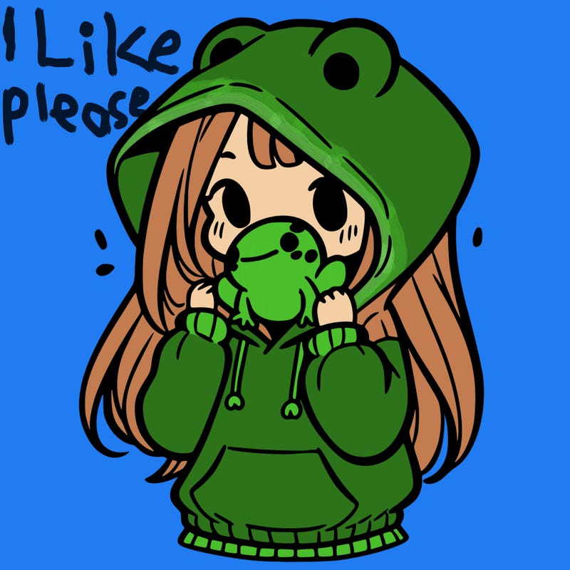 a girl holding a froggy hoodie