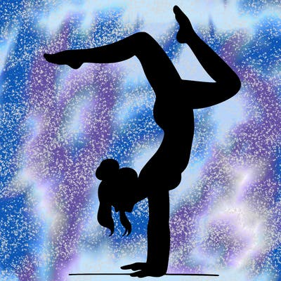 a woman doing a handstand