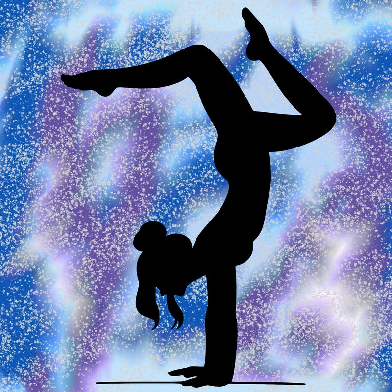 a woman doing a handstand